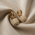 Elegant kuppelformede perleøreringer