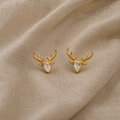 Poro-formede øredobber med klar zirkon